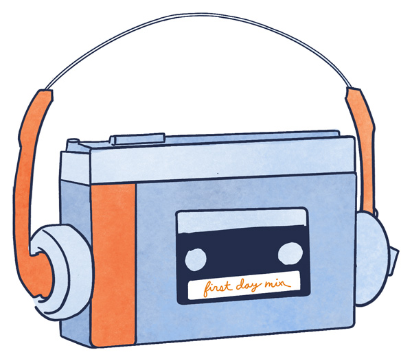 An orange and blue walkman with headphones